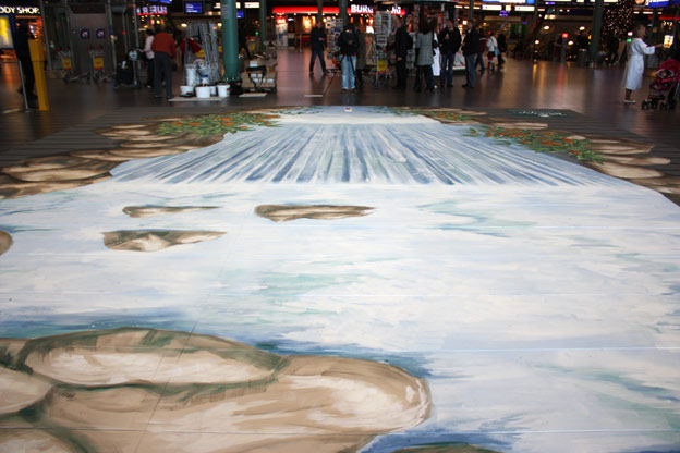 Upside down view of trompe l'oeil at Schiphol airport for Kneipp